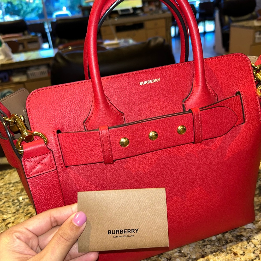 Authentic Burberry medium-sized tote in red, featuring gold studs on the front. - Picture 6 of 11